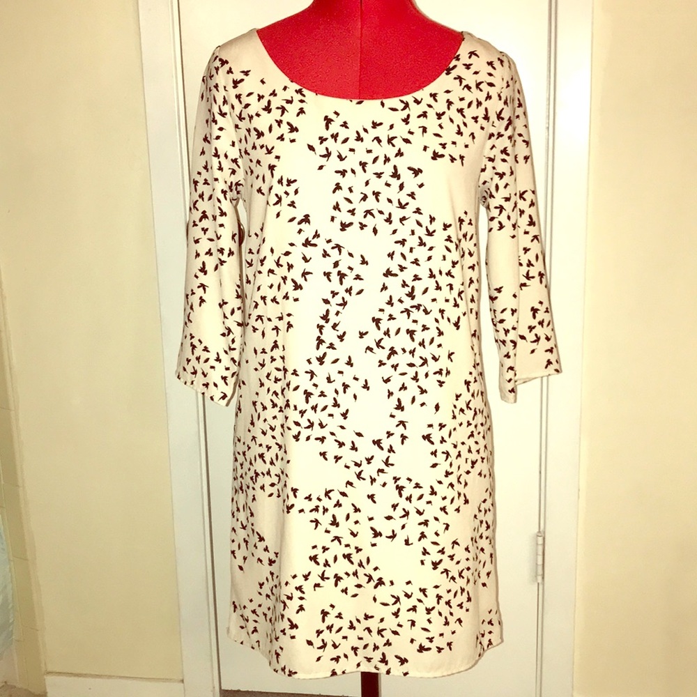 Cream colored black dress with little blackbirds